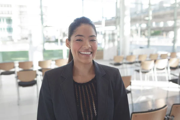 Front View Smiling Mixed Race Businesswoman Standing Empty Conference Room — Stock Photo, Image