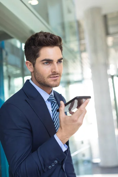Side View Young Caucasian Businessman Speaking Mobile Phone While Standing — Stock Photo, Image