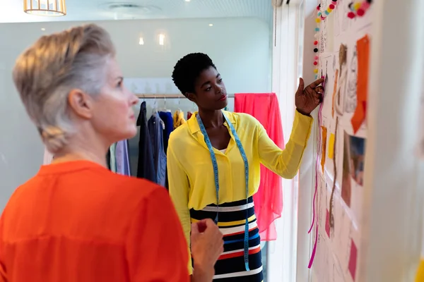 Side View Diverse Female Fashion Designers Discussing Together Sketch Design — Stock Photo, Image