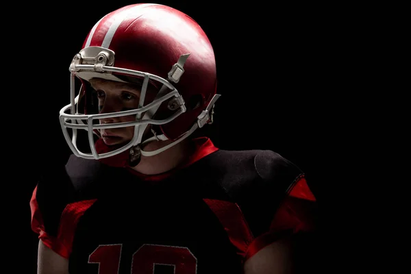 Jogador Futebol Americano Com Capacete Rugby Contra Fundo Preto — Fotografia de Stock