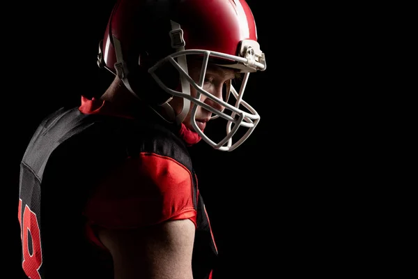 Jogador Futebol Americano Pensativo Capacete Contra Fundo Preto — Fotografia de Stock