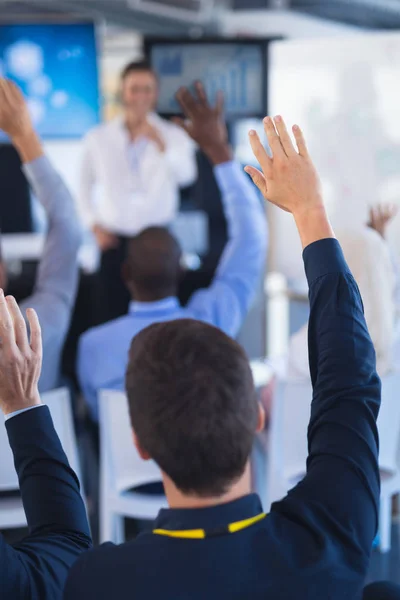 Rear View Business People Raising Hands Business Seminar — Stock Photo, Image