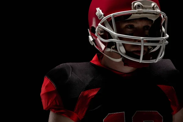 Jogador Futebol Americano Com Capacete Rugby Contra Fundo Preto — Fotografia de Stock