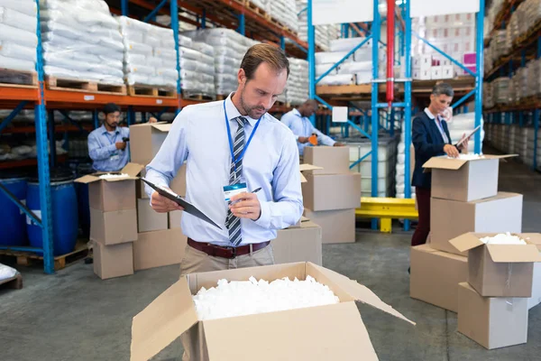 Front View Handsome Caucasian Male Supervisor Checking Stocks Warehouse — Stock Photo, Image