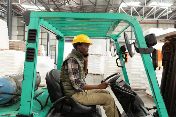 Side View Female Worker Talking Mobile Phone While Driving Forklift — Stock Photo, Image