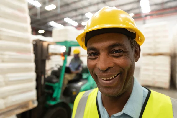 Close Happy Male Worker Looking Camera Warehouse — Stock Photo, Image