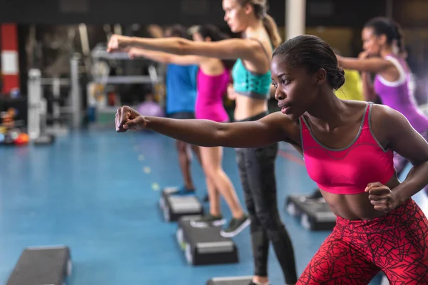 Close African American Female Athletic Exercising Fitness Center — Stockfoto