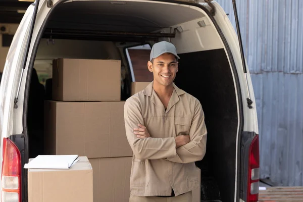 Happy Delivery Man Standing Arms Crossed Van Warehouse — Stock Photo, Image