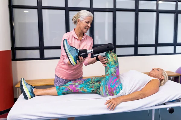 Front View Caucasian Female Trainer Assisting Disabled Active Caucasian Senior — Stock Photo, Image