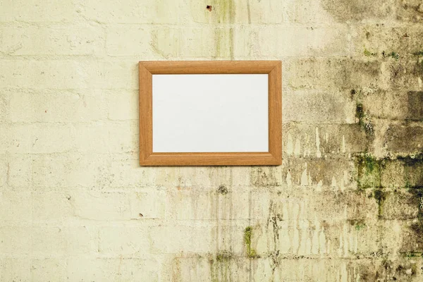 Close Framed Blank Picture Hanging Stained Brick Wall — Stock Photo, Image