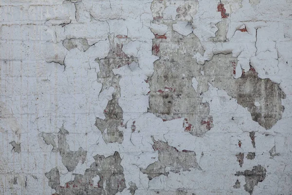 废弃仓库内部细节显示一个苦恼的白色砖墙 — 图库照片