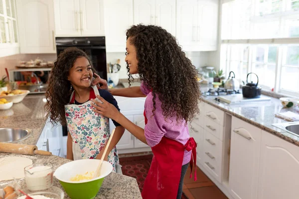 Side View Mixed Race Woman Kitchen Her Young Daughter Christmas — Stock Photo, Image