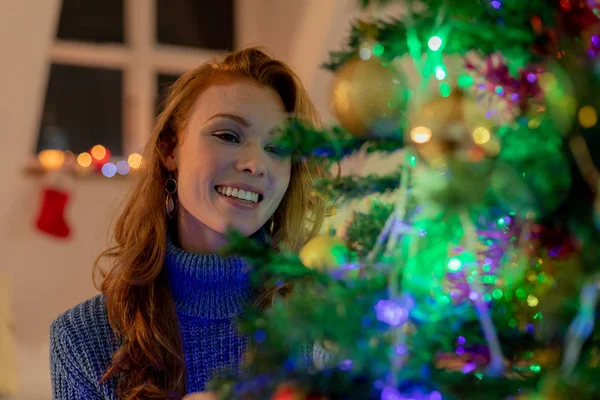 Front View Close Smiling Young Caucasian Woman Decorating Christmas Tree — Stock Photo, Image