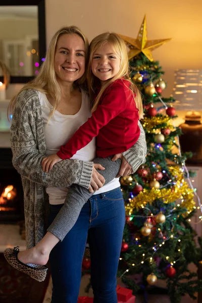 Front View Young Caucasian Woman Holding Her Young Daughter Sitting — Stock Photo, Image