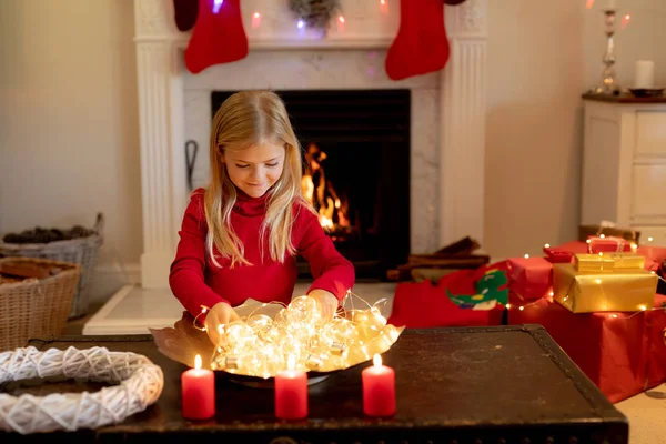 Front View Young Caucasian Girl Playing String Lights Table Her — Stock Photo, Image