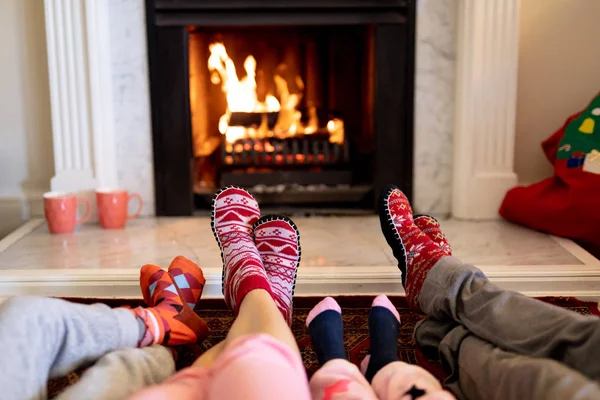 Legs Family Lying Floor Couple Young Son Daughter Warming Feet — Stock Photo, Image