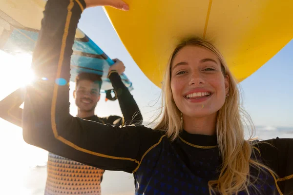 Caucasian Couple Enjoying Time Beach Sunny Day Holding Surfboards Heads — Stock Photo, Image