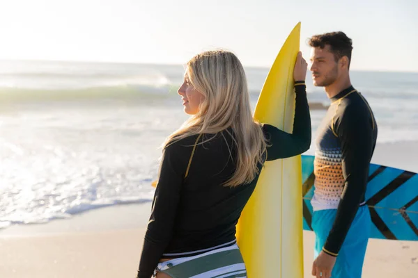 Caucasian Couple Enjoying Time Beach Sunny Day Holding Surfboards Standing — Stock Photo, Image