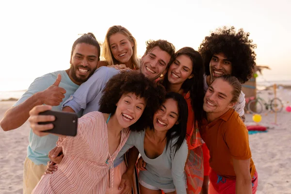 Multi Ethnic Group Friends Enjoying Time Together Holding Smartphone Taking — Stock Photo, Image