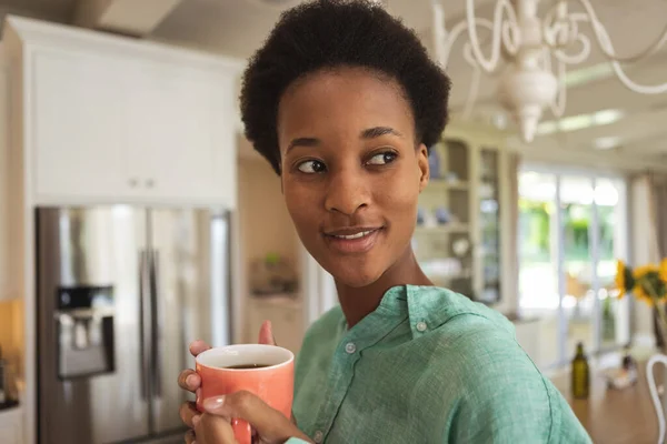 Mixed Race Woman Spending Time Home Standing Her Kitchen Holding — Stock Photo, Image