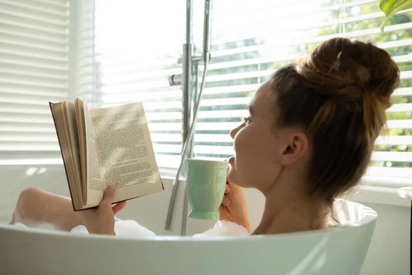 Caucasian Woman Spending Time Home Having Foamy Bath Reading Book — Stock Photo, Image