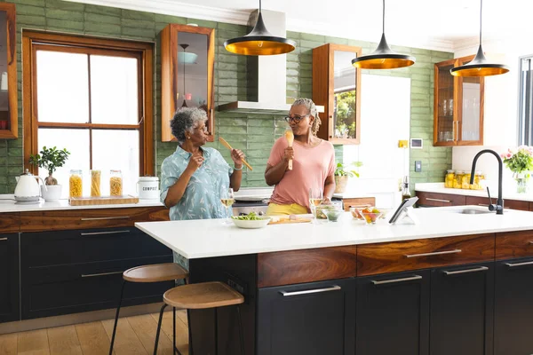 Senior African American Woman Senior Biracial Woman Cooking Together Modern — Stock Photo, Image