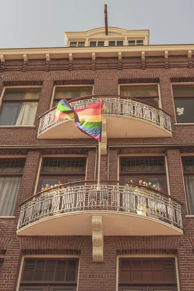 Gay Pride Rainbow Flag in a Street in historical city center of