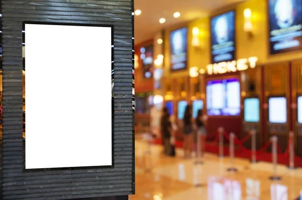 blank showcase billboard or advertising light box for your text message or media content with blurred image of ticket sales counter at movie theater, advertisement, marketing, entertainment concept