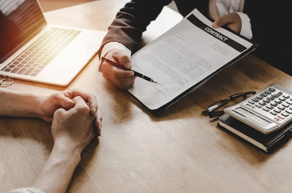 legal consultants, notary or justice lawyer discussing contract document and notebook on desk with client customer in courtroom office, business, justice law, insurance, legal service concept