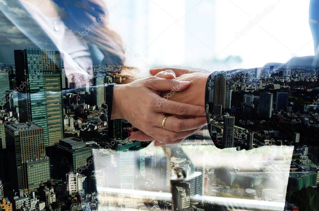 Partnership. double exposure image of investor business woman handshake with partner for successful meeting deal with during sunrise and cityscape background, investment, partnership, teamwork concept