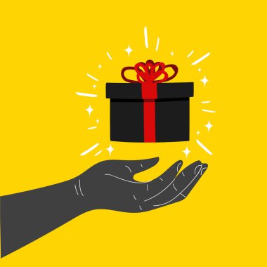 el ile hediye kutusu sarı zemin üzerine dekore edilmiştir.