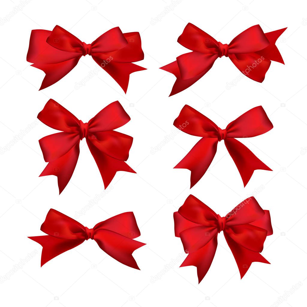 red ribbons and bows isolated on white background