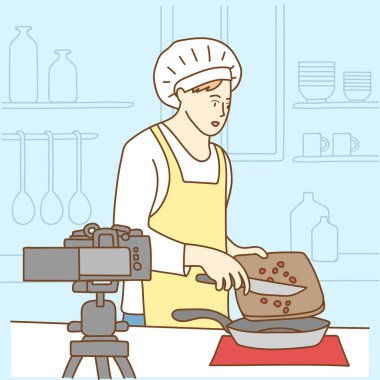 Kamera önünde duran mutfakta yemek pişiren kadın, youtube konsepti.