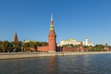 View of the Kremlin walls with towers and the Grand Kremlin Palace, Moscow, Russia. clipart