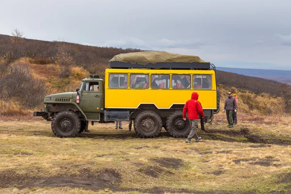 Russian off-road extreme expedition truck with passengers, Kamchatka, Russia. — Stock Photo, Image