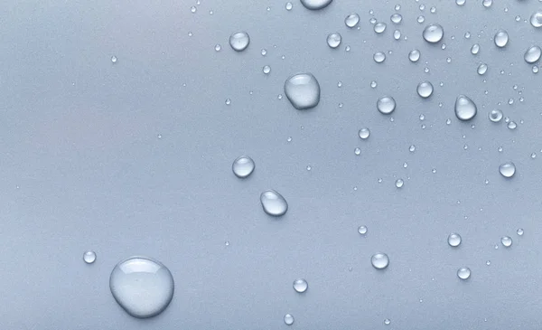 Wassertropfen Auf Einem Farbigen Hintergrund Grau — Stockfoto