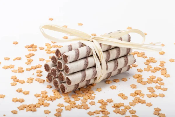 Tubos Gofre Con Crema Chocolate Sobre Fondo Blanco Con Estrellas — Foto de Stock