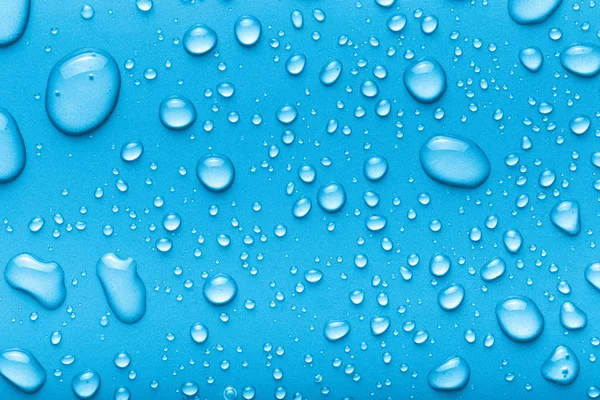 Droppar Vatten Färg Bakgrund Blå Tonad — Stockfoto