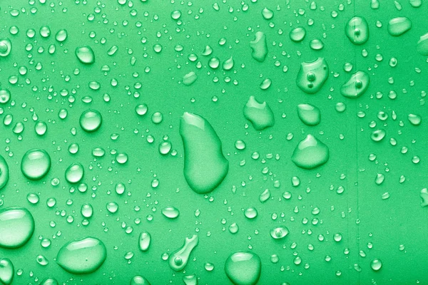 Gotas Agua Sobre Fondo Color Verde Tonificado —  Fotos de Stock