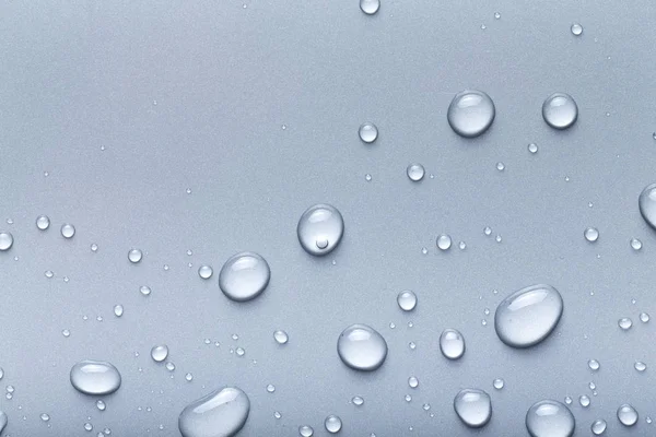 Wassertropfen Auf Einem Farbigen Hintergrund Grau — Stockfoto