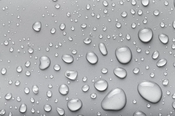 Druppels Water Een Gekleurde Achtergrond Gray — Stockfoto