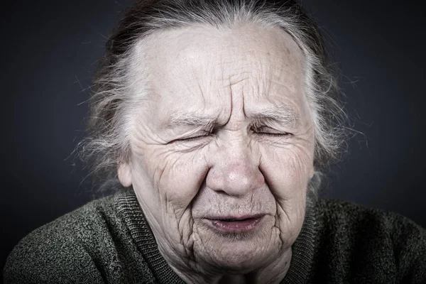 Portrait of elderly woman. Discontent. Toned — Stock Photo, Image