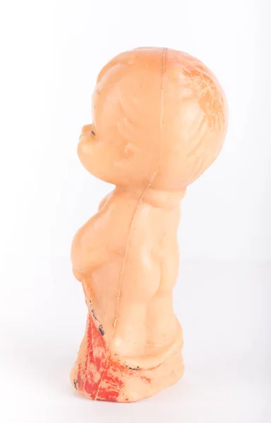 Old plastic doll on a light background — Stock Photo, Image