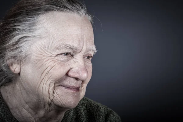 Portrait of elderly woman. Laugh. Toned — Stock Photo, Image