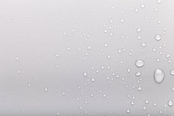 Gotas de agua sobre un fondo de color. Gris —  Fotos de Stock