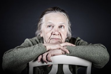 Portrait of elderly woman. Thoughtfulness. Toned clipart