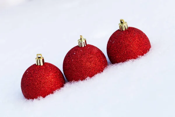 Bright balls on a clean pure snow for natural winter background. — Stock Photo, Image