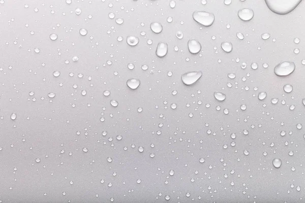 Bir renk arka plan üzerinde Su damlacıkları. Gri