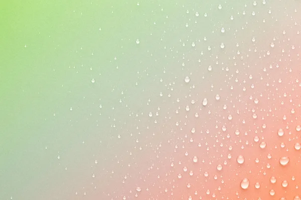 Drops of water on a color background — Stock Photo, Image