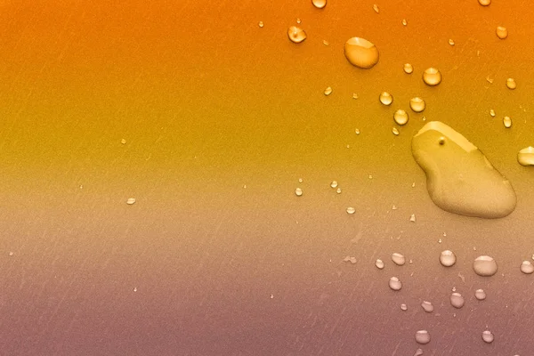 Drops of water on a color background — Stock Photo, Image
